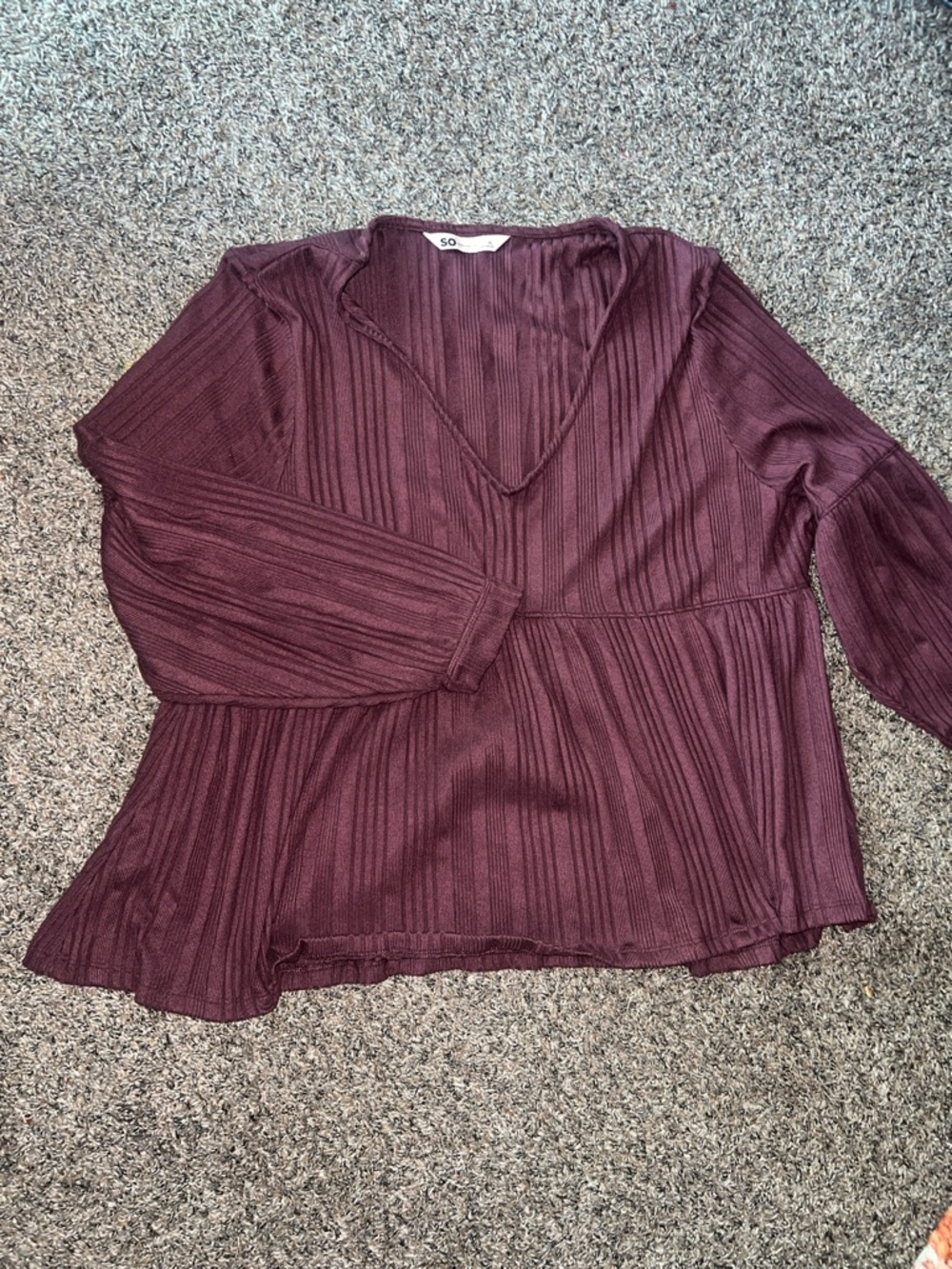 SO Ribbed V-Neck Peplum Blouse